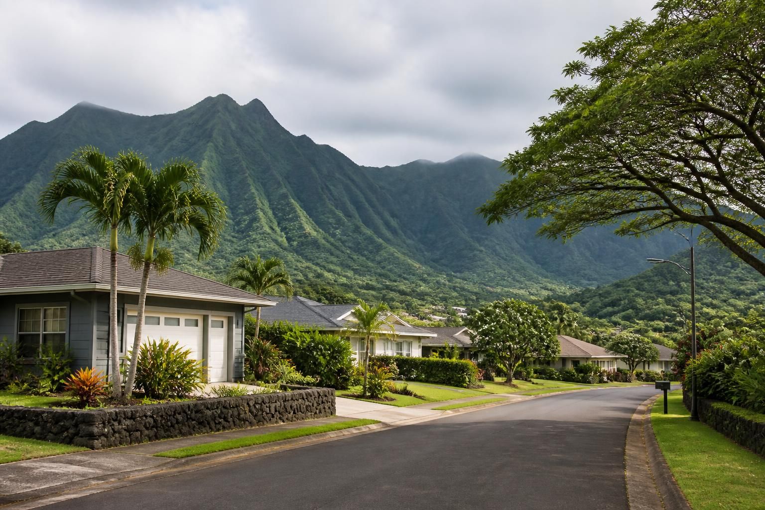 Kaneohe homes set against lush mountains and soft daylight.